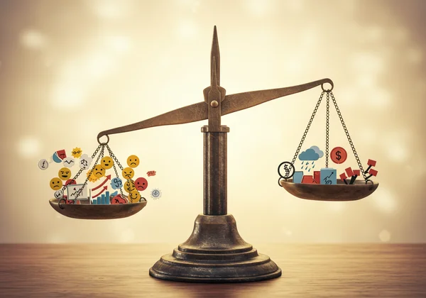 Weighing outcomes: a scale balancing good and bad results.